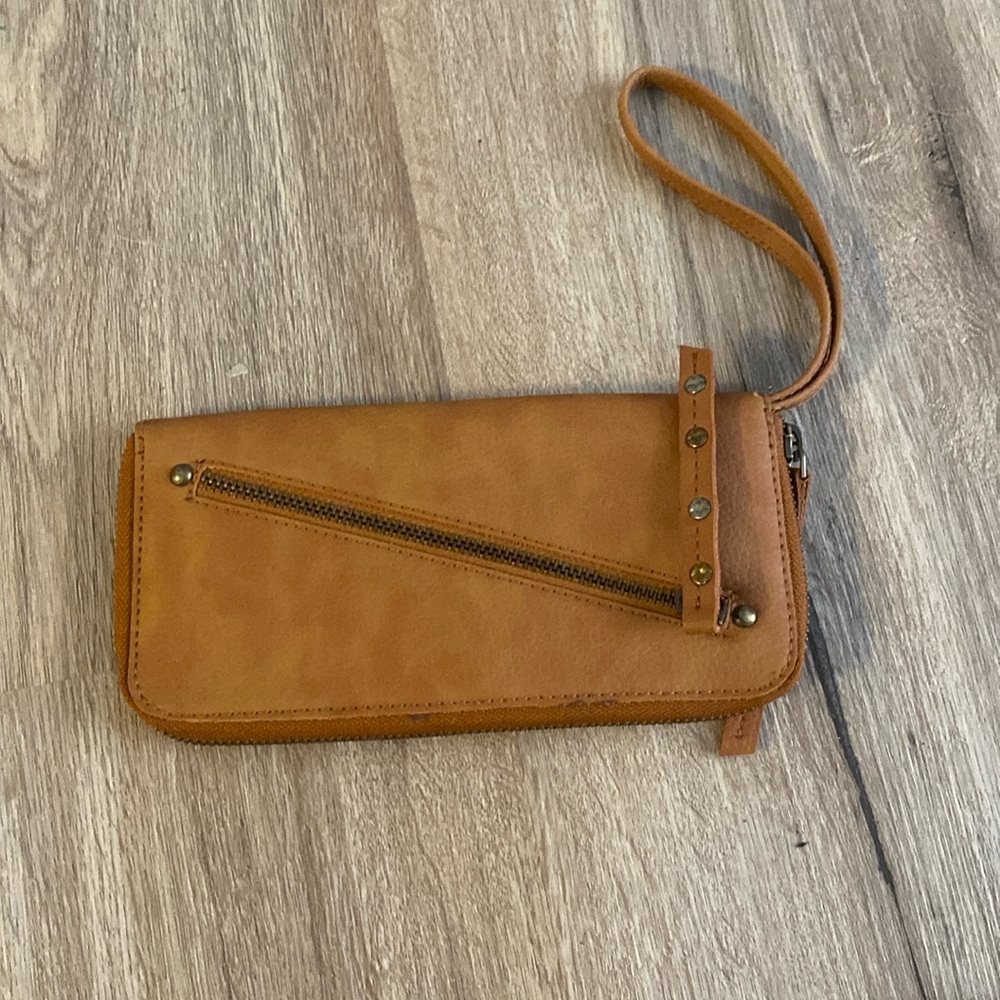 Brown hand held wallet